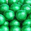 Party Delights Green Foil Chocolate Balls X25< Chocolates